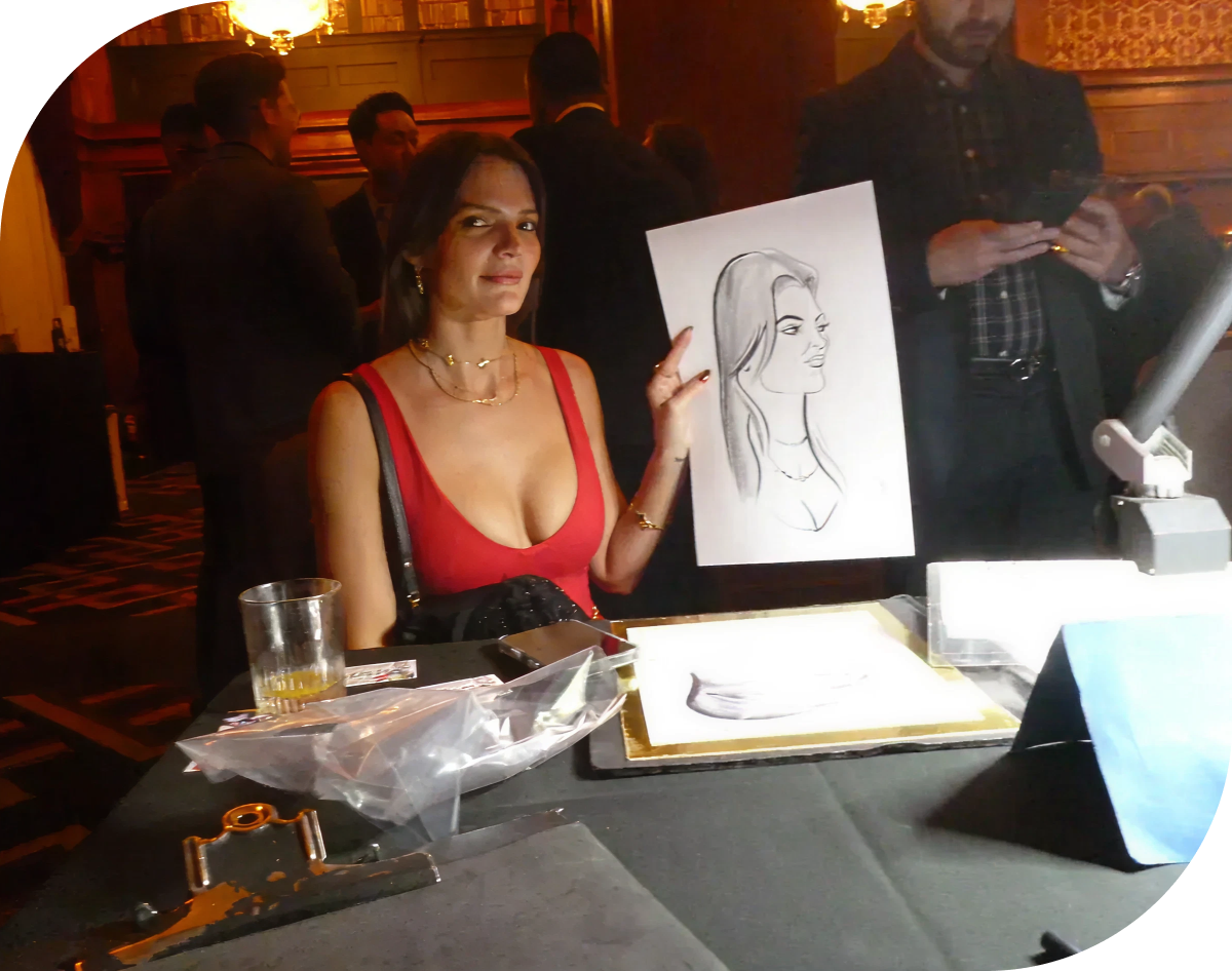 Woman in red dress holding drawing