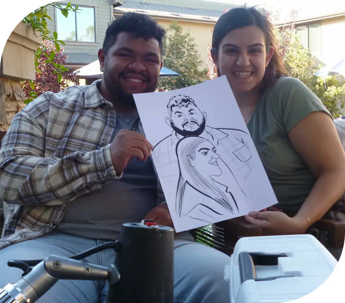 Smiling pair with artwork outdoors